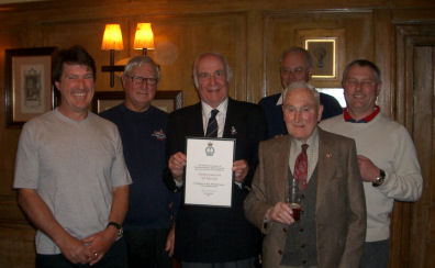 Aylesbury RNLI Branch committee presenting a framed certificate to Aylesbury Green Park Sub-Aqua Club to mark 10 years of fundraising by the club for the RNLI